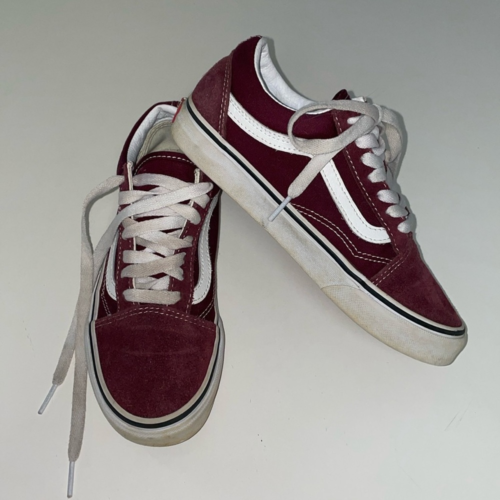 Burgundy and white Vans Trainers.